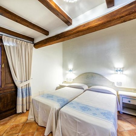 Hotel Costa Caddu Сан Теодоро Екстериор снимка